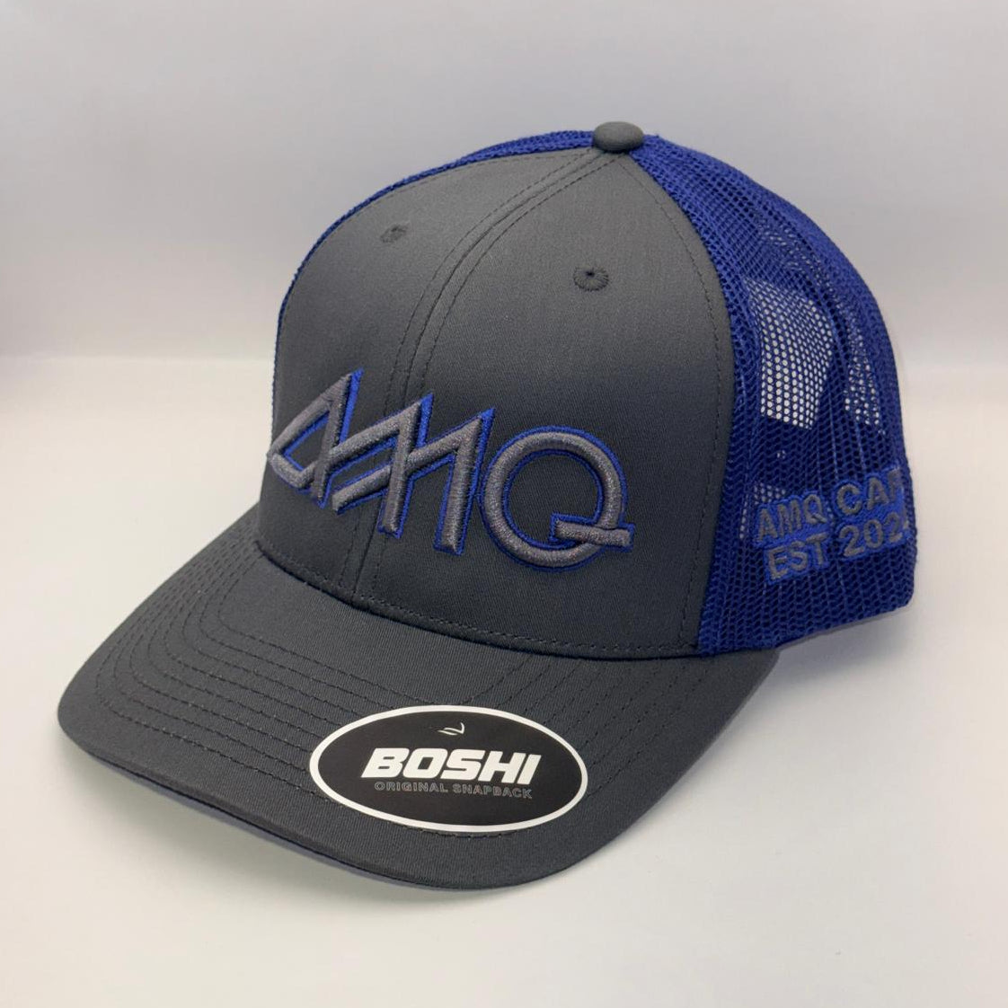 A dark gray and blue trucker-style cap with a curved brim, featuring a large embroidered '441Q' logo on the front, a 'BOSHI' sticker on the brim, and blue mesh back panels.